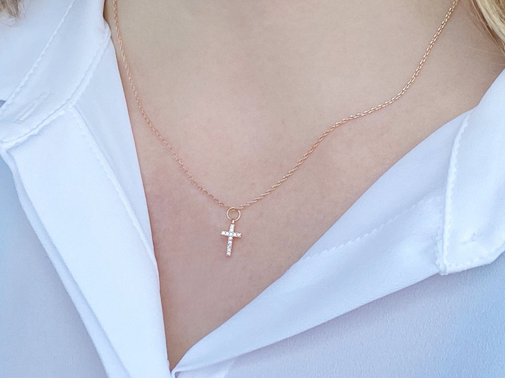 cross necklace with white shirt