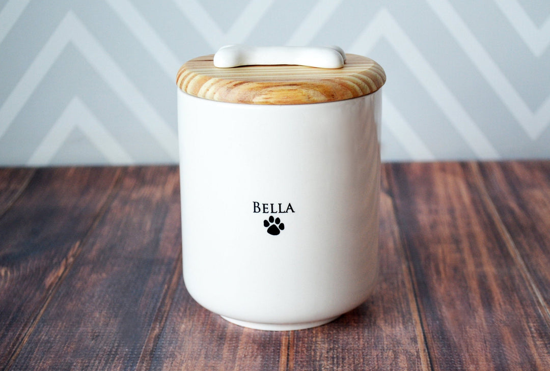 pet memorial urn personalized with pet's name and a paw print