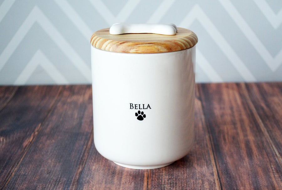 pet memorial urn personalized with pet's name and a paw print