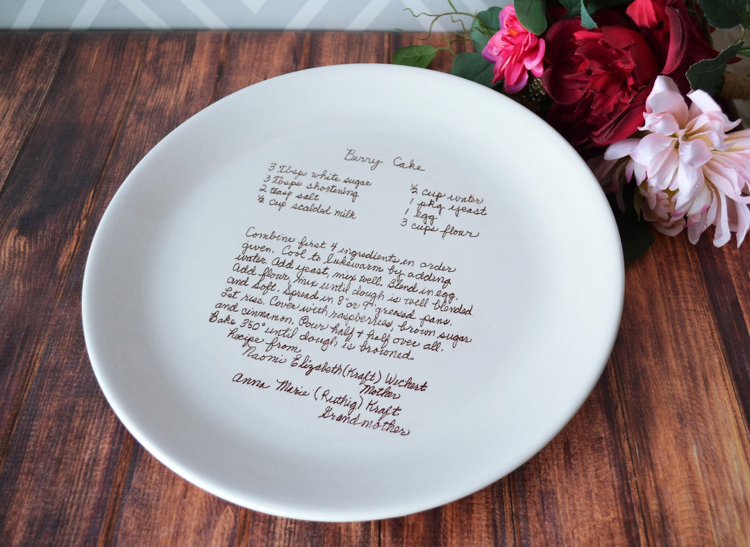 Round white ceramic platter customized with a family cake recipe