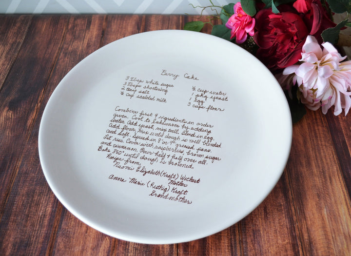Round white ceramic platter customized with a family cake recipe