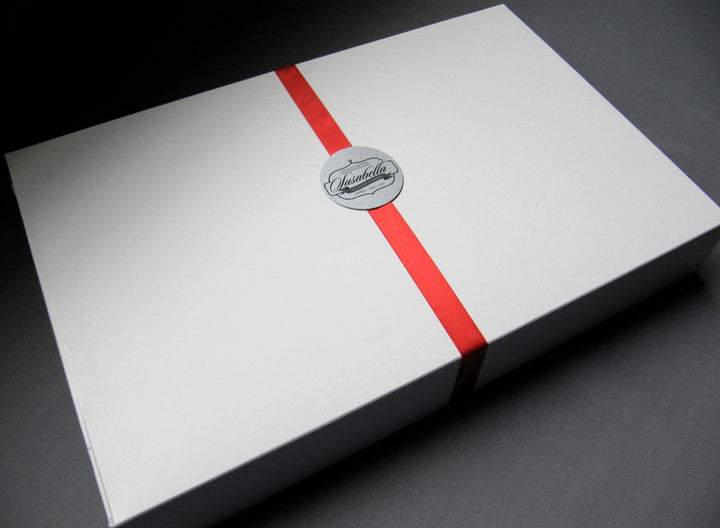 Susabella gift box with red ribbon