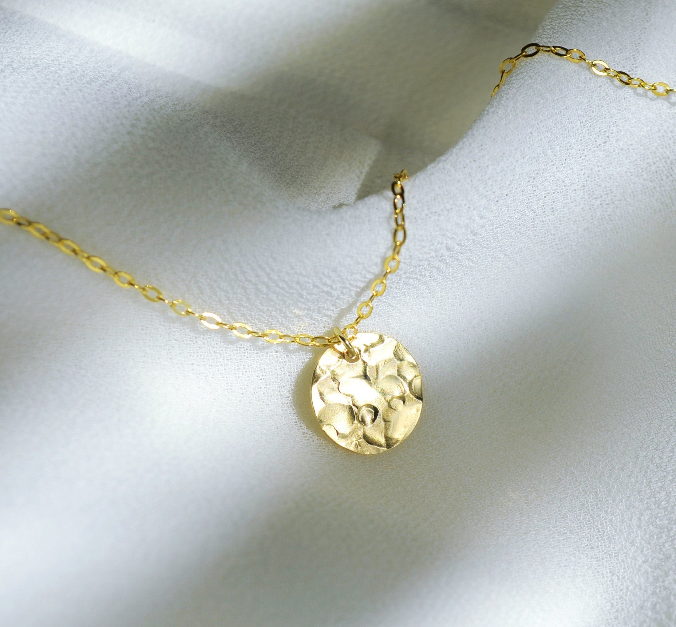 Hammered gold disc on sale necklace