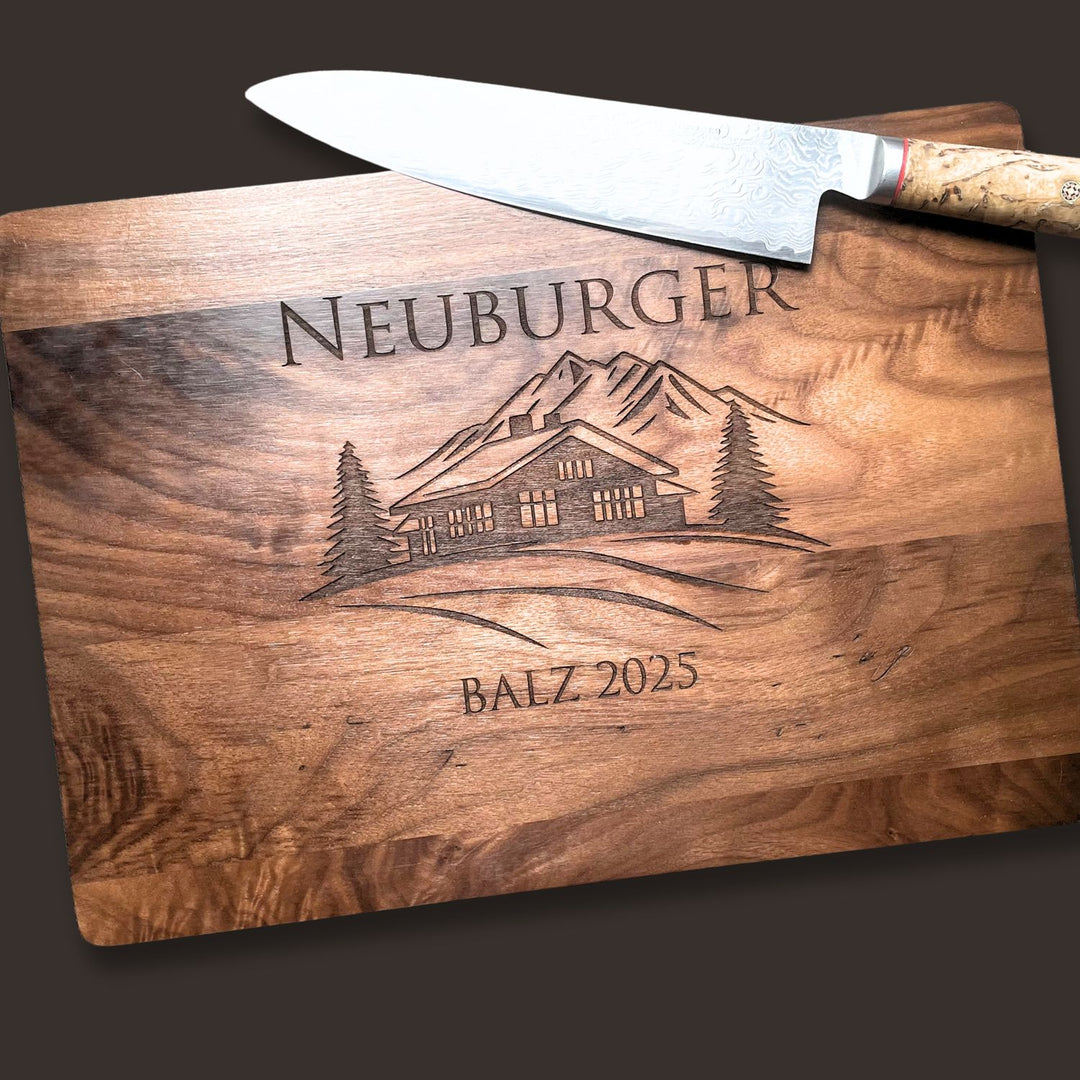 Walnut cutting board with engraved mountain home design