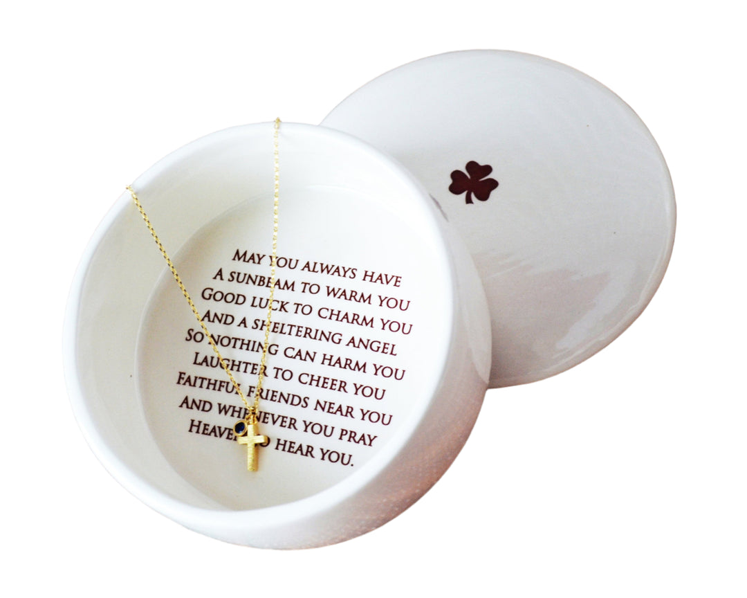 round ceramic box with irish blessing and cross necklace