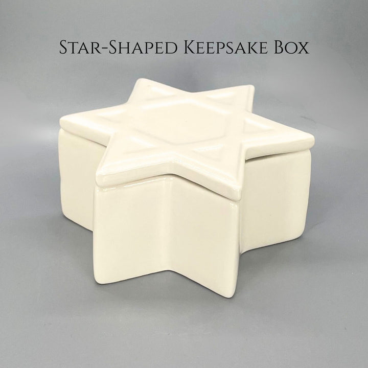 Star-shaped keepsake box on a gray background with text 'STAR-SHAPED KEEPSAKE BOX'.