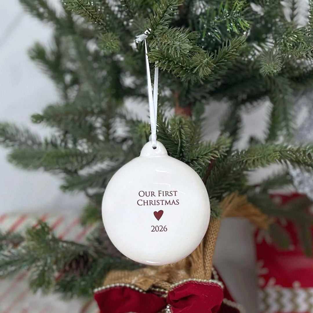 Our First Christmas 2026 - White Holiday Bulb Ornament - Ceramic - 3 in.