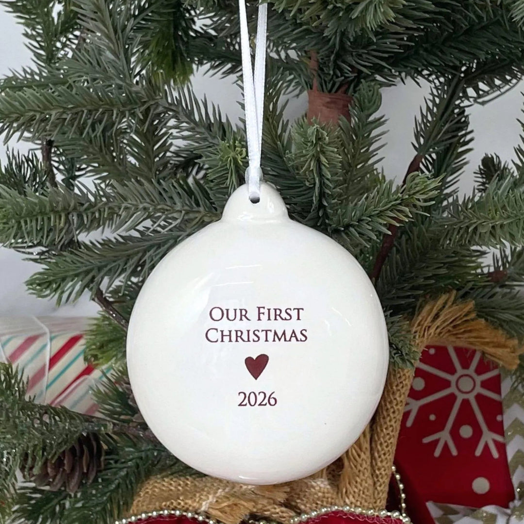 Our First Christmas 2026 - White Holiday Bulb Ornament - Ceramic - 3 in.