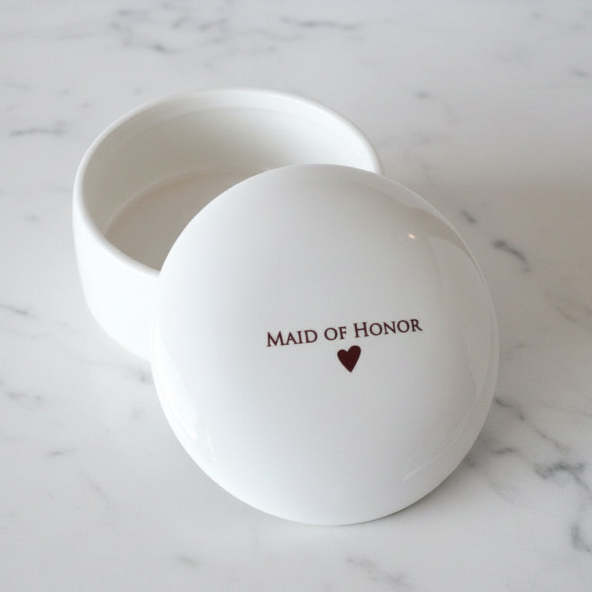 White jewelry box with 'Maid of Honor' on lid