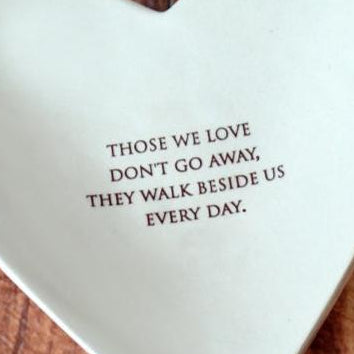 close up of imprinted text - those we love don't go away