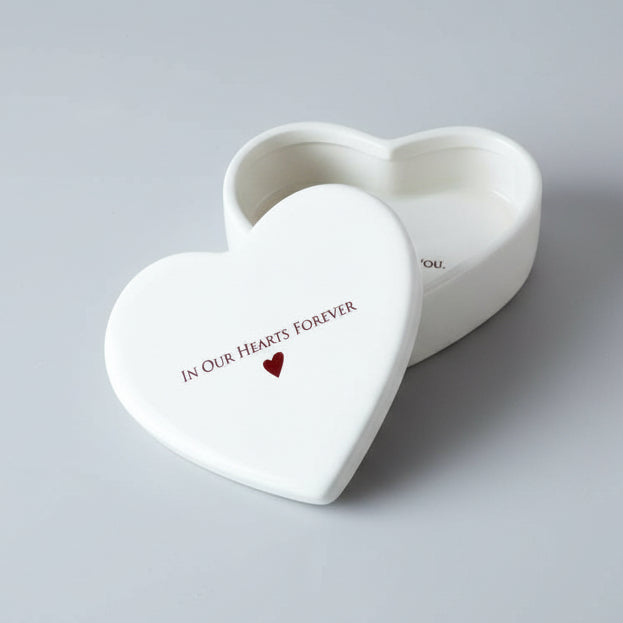 Heart-shaped ceramic box with 'In Our Hearts Forever' text 