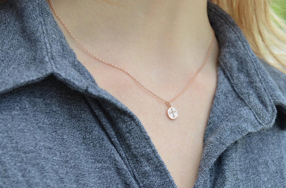 cross necklace in rose gold
