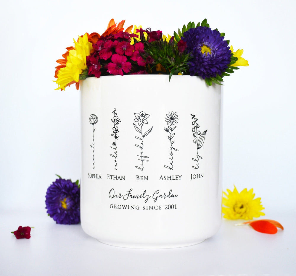 White container with floral design and names printed on a white background