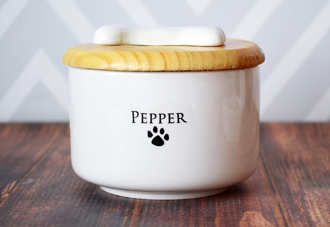 custom urn for your pet - Pepper (name) above a paw print